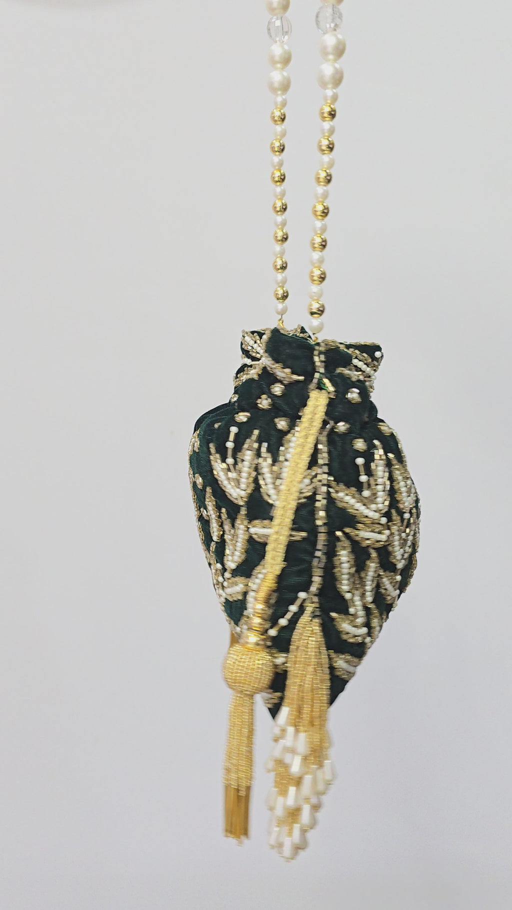 Green hand work potli bag