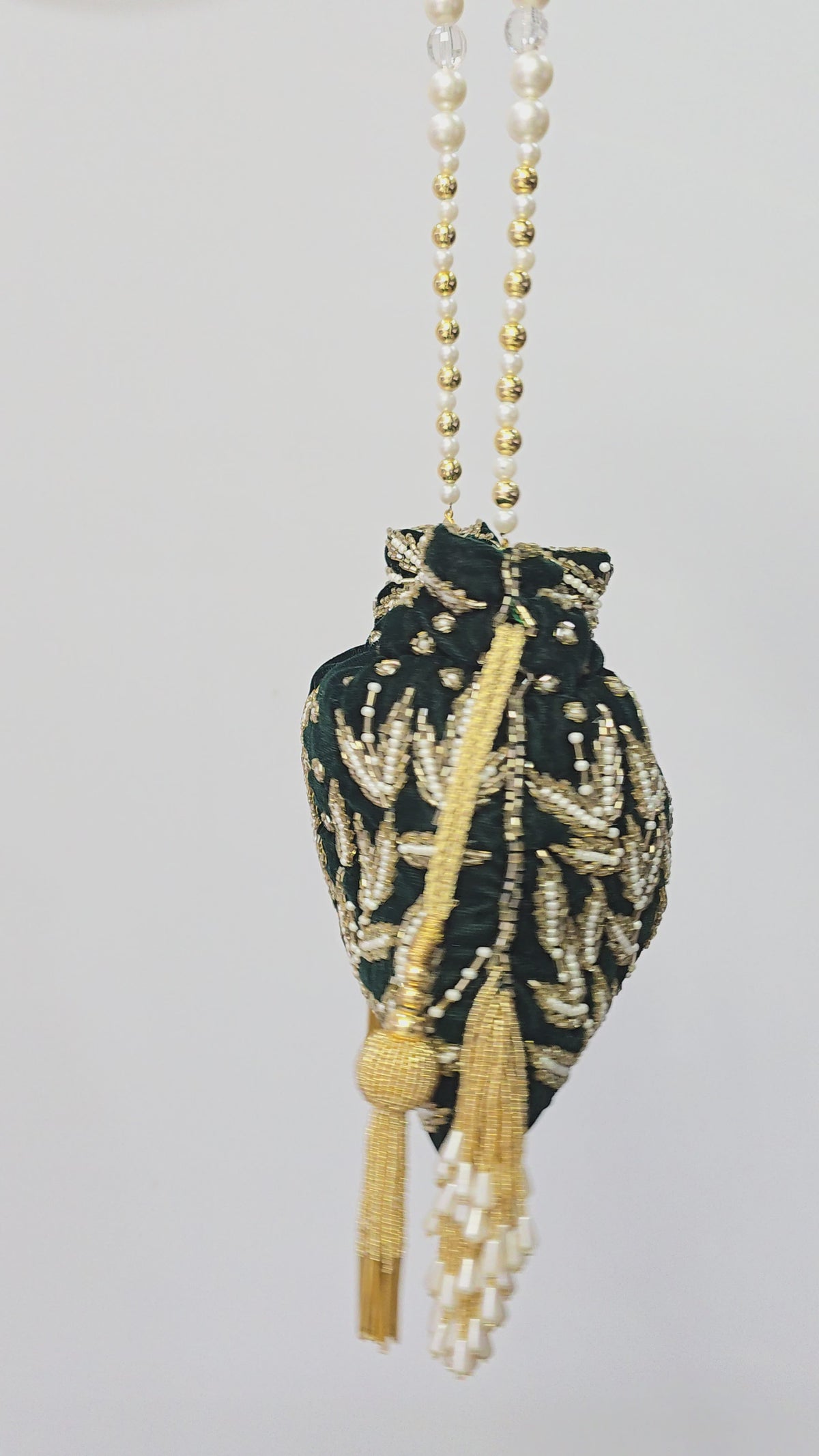 Green hand work potli bag