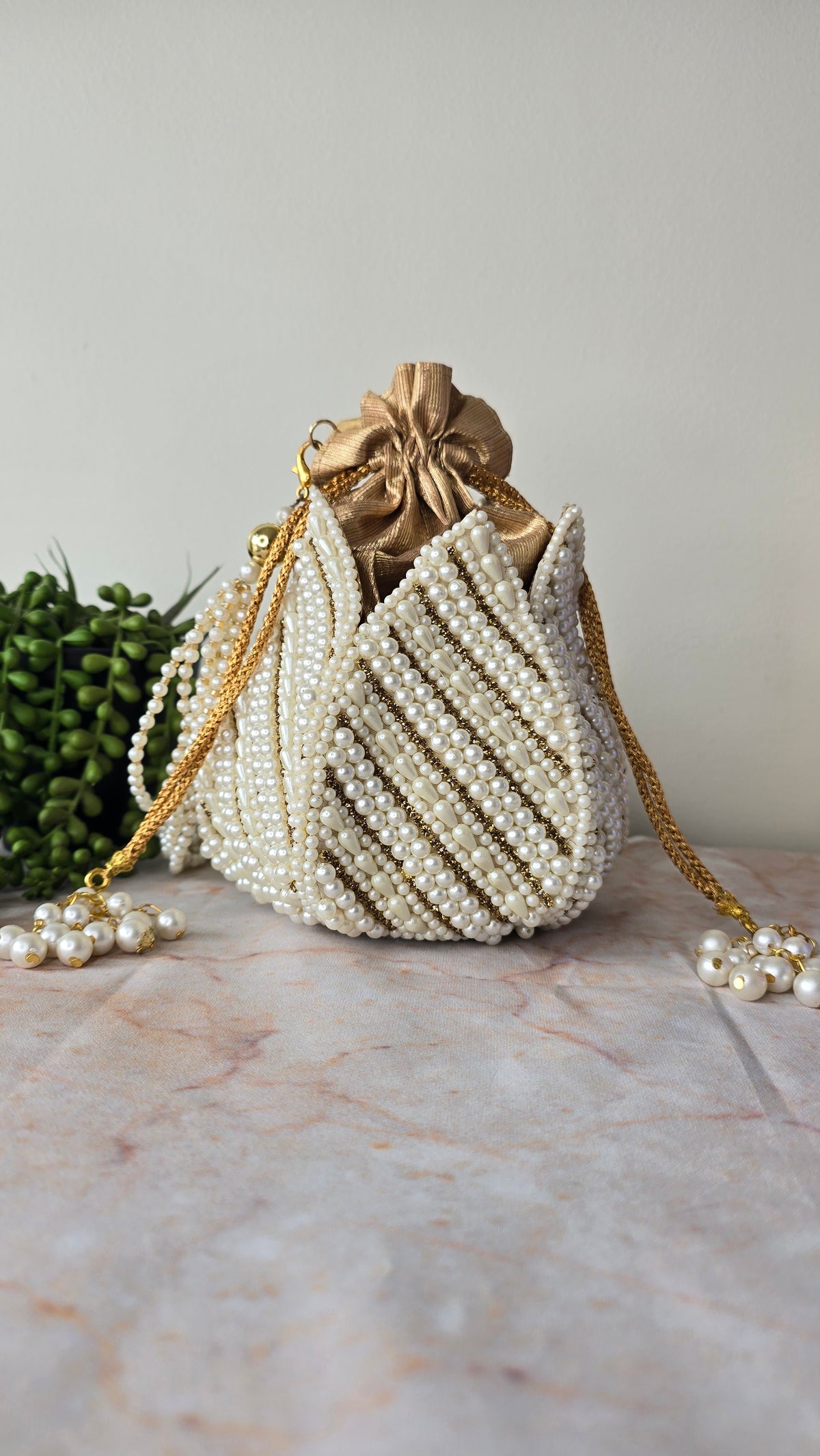 Pearl gold embroidered potli bag