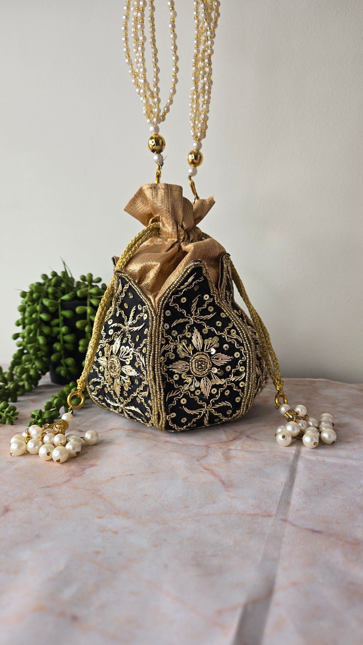 Black embroidered potli bag