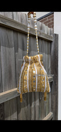Gold pearl hand work potli bag