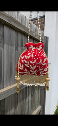 Red hand work potli bag