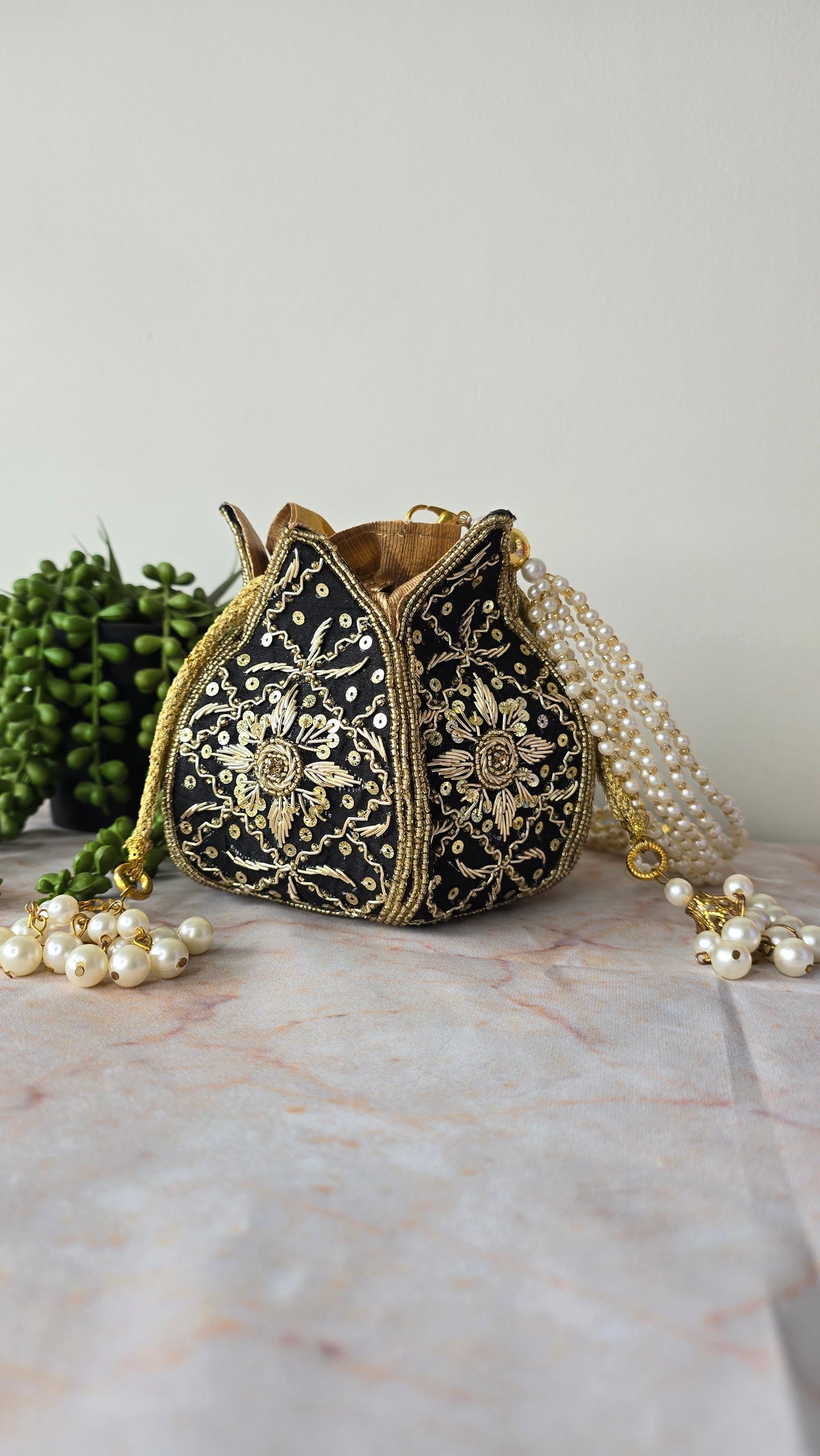 Black embroidered potli bag